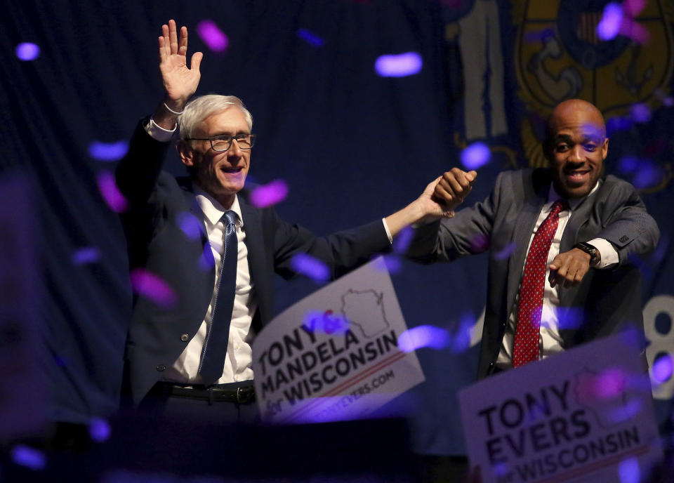 Wisconsin Democratic gubernatorial candidate Tony Evers, left, and Lieutenant Governor candidate Mandela Barnes appear at a post election party at the Orpheum Theater in Madison, Wis., Wednesday, Nov. 7, 2018. (John Hart/Wisconsin State Journal via AP)