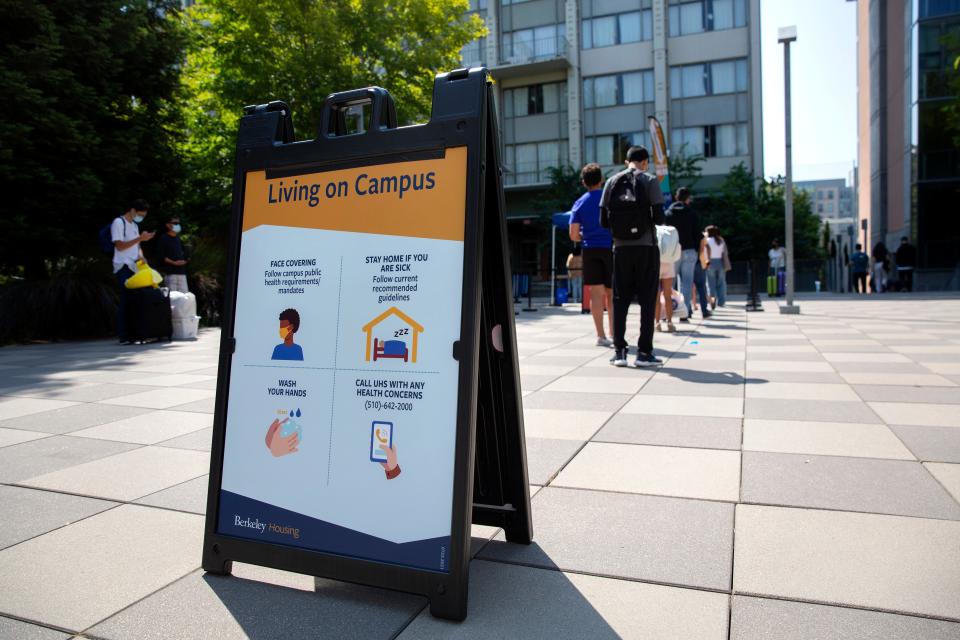 Campus dorm regulations are posted on signs as students move-in on campus at the University of California, Berkeley on Aug. 16, 2021.