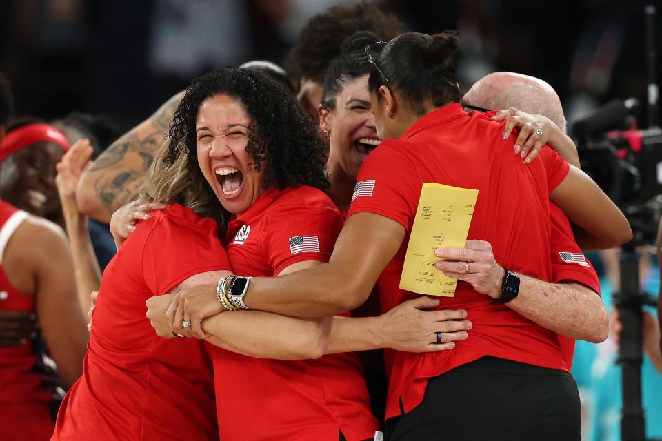 PARIS, FRANCE - AUGUST 11: Assistant coach Kara Lawson of Team United States celebrates after her team's victory against Team France during the Women's Gold Medal game between Team France and Team United States on day sixteen of the Olympic Games Paris 2024 at Bercy Arena on August 11, 2024 in Paris, France. (Photo by Elsa/Getty Images) ORG XMIT: 776138675 ORIG FILE ID: 2166338172