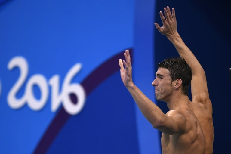 Michael Phelps celebrates after the USA won the Men's swimming 4 x 100m Medley Relay Final at the Rio 2016 Olympic Games