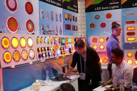 FILE PHOTO: LED lights are on display inside a booth at the Canton Fair in Guangzhou, China October 16, 2017. REUTERS/Venus Wu/File Photo