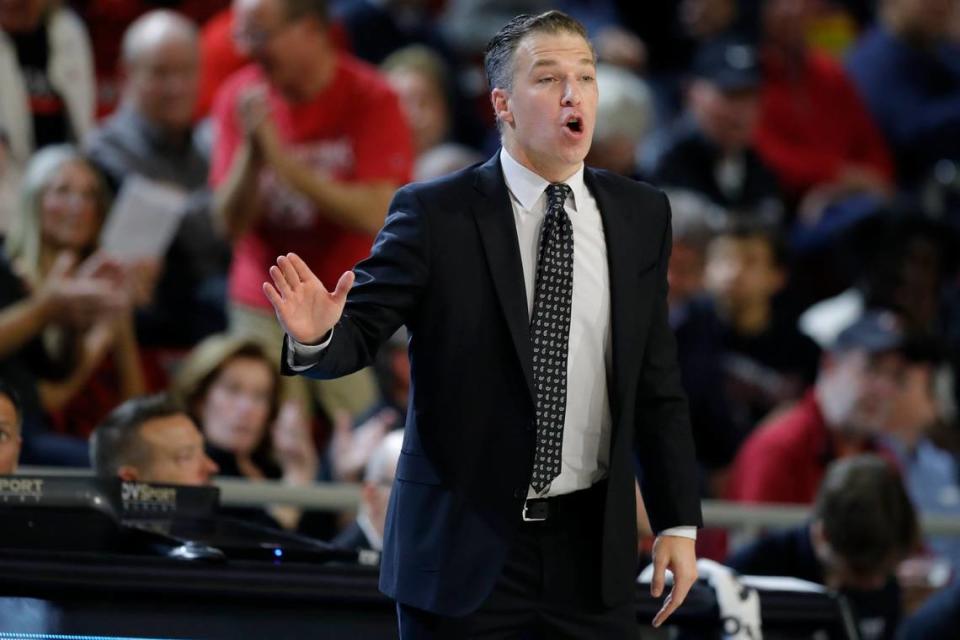 Davidson Wildcats head coach Matt McKillop watches from the bench during a game against the Charlotte 49ers at Belk Arena in Davidson, N.C., Tuesday, Nov. 29, 2022.