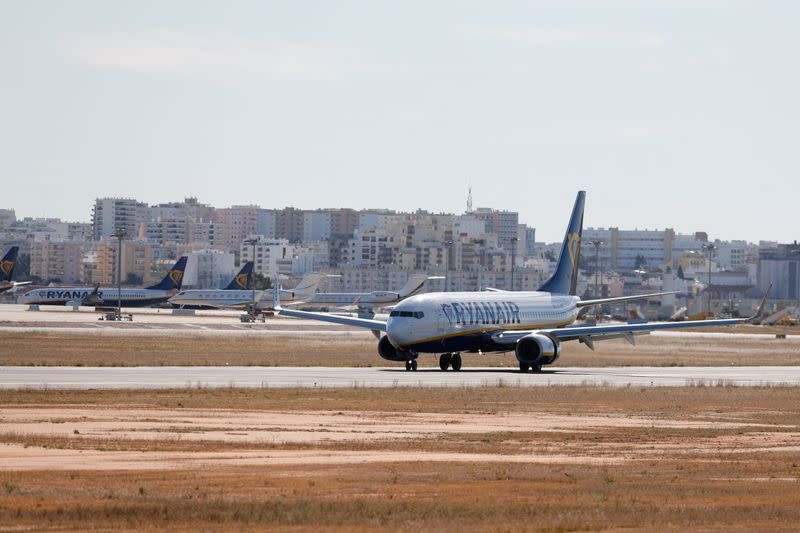 FILE PHOTO: British tourists return to Portugal