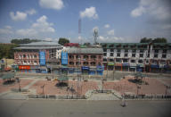 A man walks at a deserted market area during lockdown to stop the spread of the coronavirus in Srinagar, Indian controlled Kashmir, July 22, 2020. Indian-controlled Kashmir's economy is yet to recover from a colossal loss a year after New Delhi scrapped the disputed region's autonomous status and divided it into two federally governed territories. (AP Photo/Mukhtar Khan)