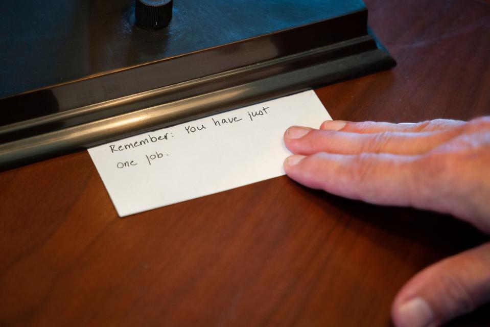 Len Niehoff, a professor at the University of Michigan Law School, shows a note that inspires him inside his office at Hutchins Hall in Ann Arbor on Wednesday, August 30, 2023.