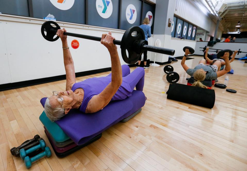 Betty Lassiter, 81, works out in a group exercise class at the Pat Jones YMCA on Monday, Jan. 10, 2022, 