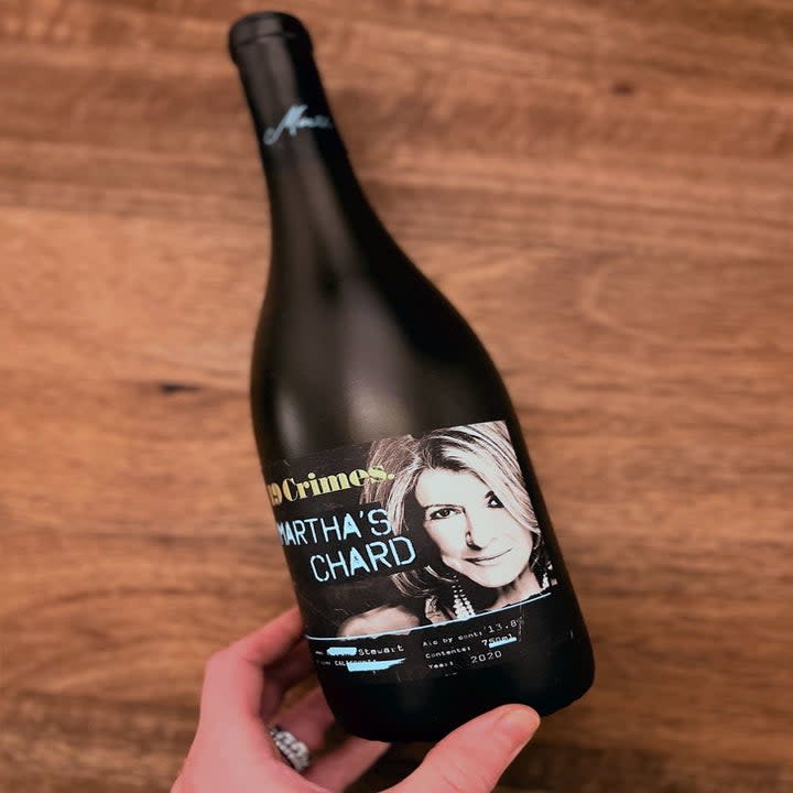 A bottle of white wine with a woman on the label
