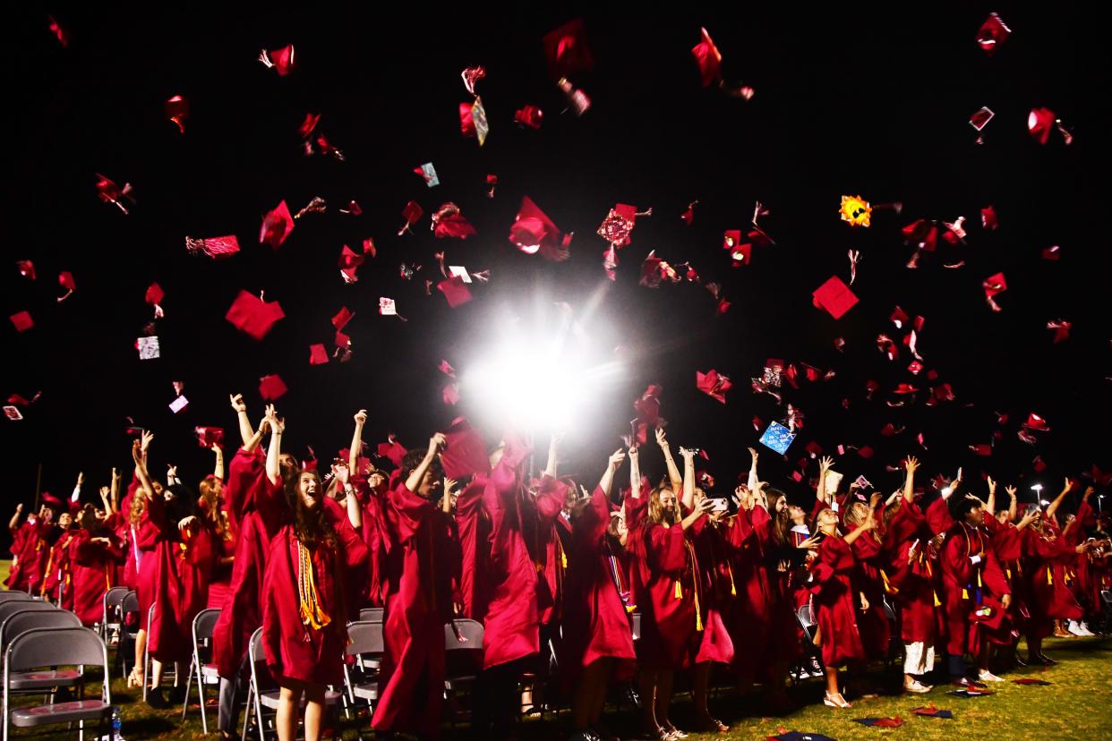 Under cool, breezy skies Satellite High School held their graduation ceremony at Scorpion Football Stadium Monday night.