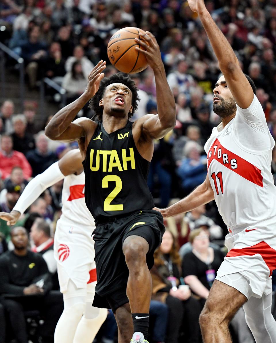 Utah Jazz guard Collin Sexton (2) takes the ball up against Toronto Raptors center Jontay Porter (11) as the Jazz and Raptors play at the Delta Center in Salt Lake City on Friday, Jan. 12, 2024. Utah won 145-113. | Scott G Winterton, Deseret News