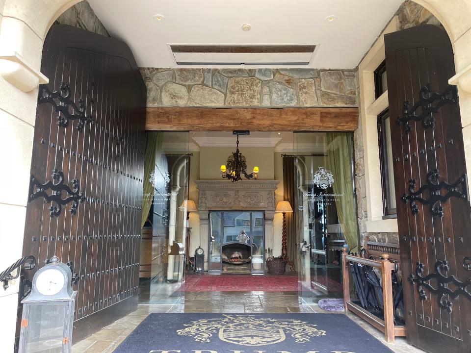 Large double doors opening up to regal-looking entryway at Trump International Hotel in Ireland