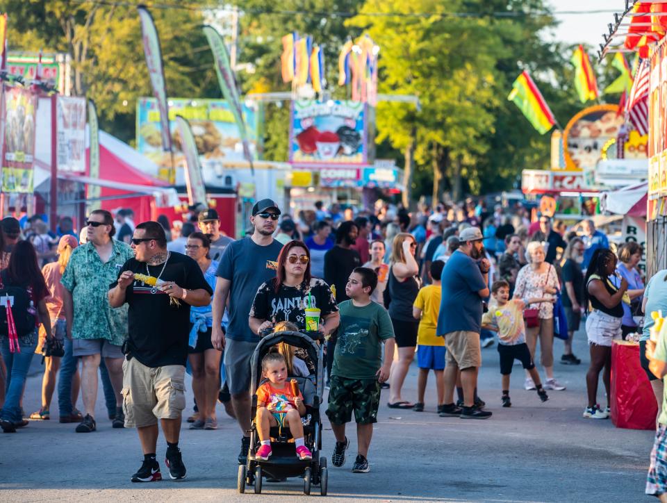 Visitors make their way around the Wilson County Fair — Tennessee State Fair in Lebanon on Aug 18, 2022.