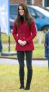 <p>The Duchess of Cambridge wears a Philosophy di Lorenzo Serafini red blazer, black turtleneck, gloves, dark wash jeans and knee-high boots while visiting RAF Wittering near Peterborough. </p>