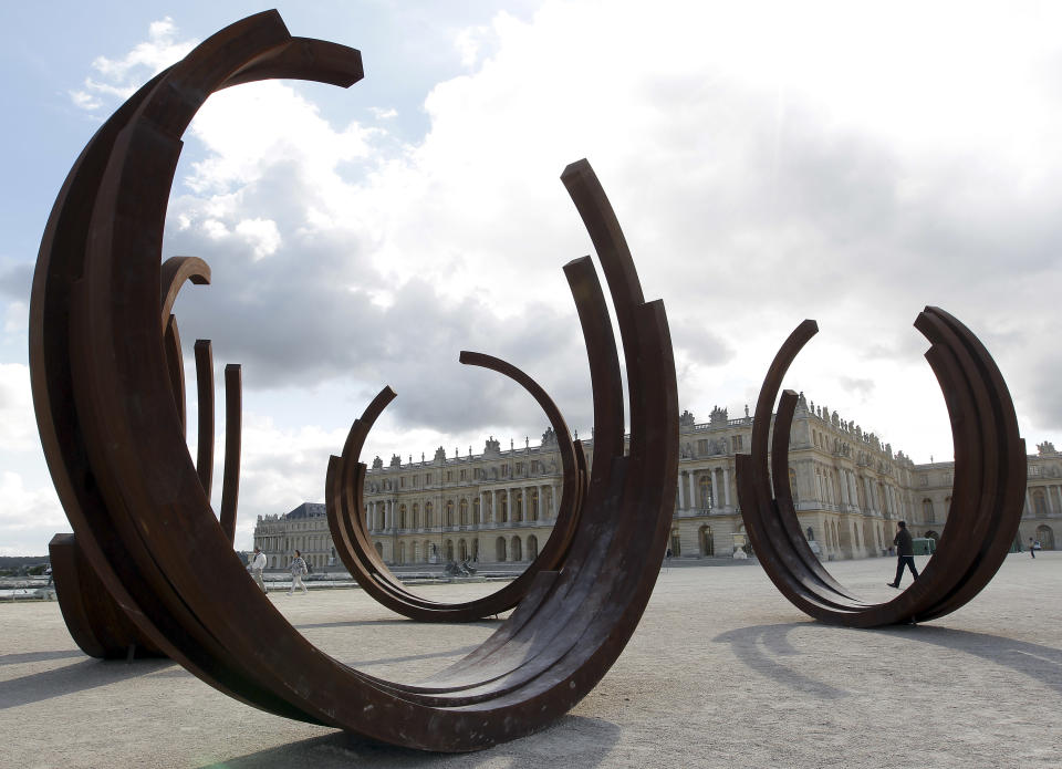 FILE - In this May 27 2011 file photo, a monumental sculpture of the french artist Bernar Venet in the Versailles Palace gardens, west of Paris. : Versailles, Vaux le Vicomte, Fontainebleau. Monet's house and gardens at Giverny are also open during the spring, summer and fall. Sundays are good for exploring these mansions and having a picnic in the grounds. (AP Photo Bob Edme, File)