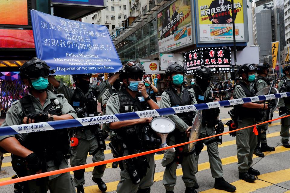 hong kong riot police in line.JPG