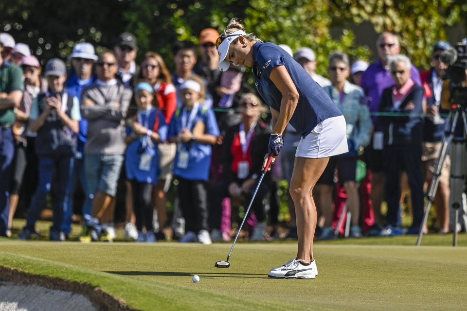Lexi Thompson putts on the ninth green during the final round of the LPGA Pelican Women's Championship golf tournament at Pelican Golf Club, Sunday, Nov. 14, 2021, in Belleair, Fla. (AP Photo/Steve Nesius)