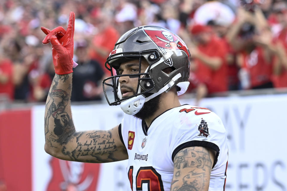 Tampa Bay Buccaneers wide receiver Mike Evans celebrates after scoring during the first half of an NFL football game between the Carolina Panthers and the Tampa Bay Buccaneers on Sunday, Jan. 1, 2023, in Tampa, Fla. (AP Photo/Jason Behnken)