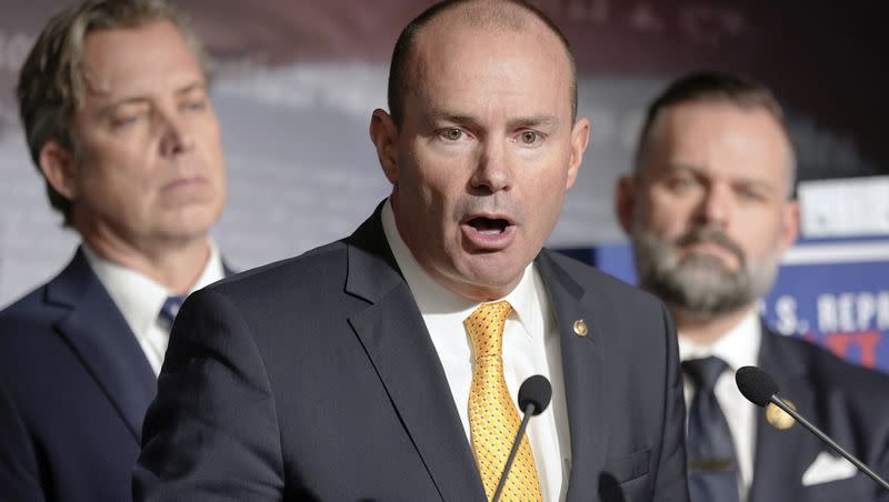 Sen. Mike Lee, R-Utah, center, speaks during a news conference on border security and funding on Capitol Hill on Jan. 10, 2024, as Rep. Cory Mills, R-Fla., right, and Rep. Andrew Ogles, R-Tenn., left, listen in Washington.