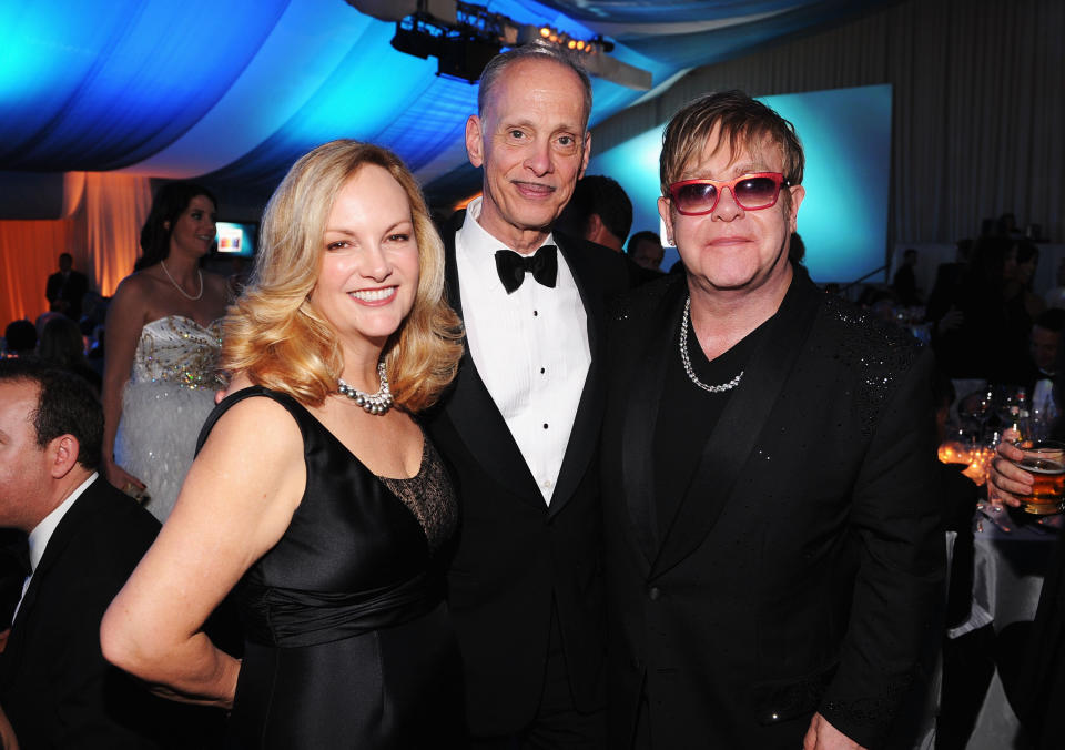 Patty Hearst, John Waters and Elton John at the annual Elton John AIDS Foundation Oscar viewing party in 2012. (Photo: Jamie McCarthy via Getty Images)