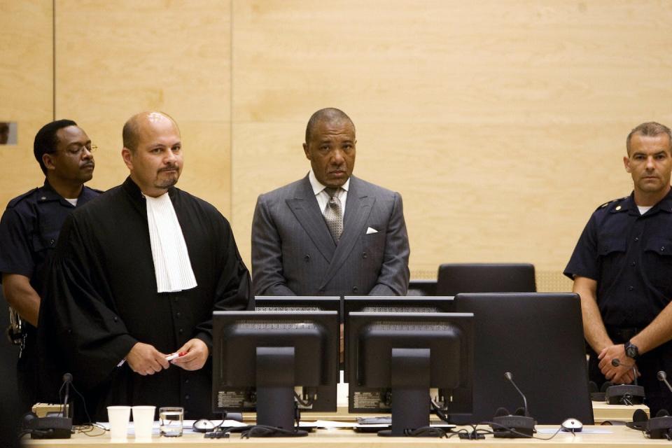 Former Liberian President Charles Taylor appears in court in July 2006 in the Netherlands. <a href="https://media.gettyimages.com/id/71493600/photo/former-liberian-president-charles-taylor.jpg?s=1024x1024&w=gi&k=20&c=fcL1dLZaJCAdx7DJFteUmx3wkfxIYpVDa1SxUYqSCfE=" rel="nofollow noopener" target="_blank" data-ylk="slk:Rob Keeris/AFP via Getty Images;elm:context_link;itc:0;sec:content-canvas" class="link ">Rob Keeris/AFP via Getty Images</a>