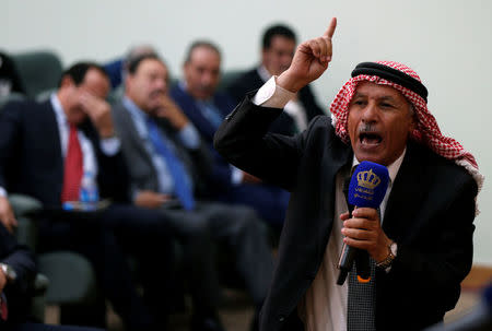 Saleh al-Armouti, member of the Jordanian parliament, speaks during an emergency meeting to discuss a potential announcement by the U.S. to move its embassy to Jerusalem, at the parliament in Amman, Jordan, December 6, 2017. REUTERS/Muhammad Hamed