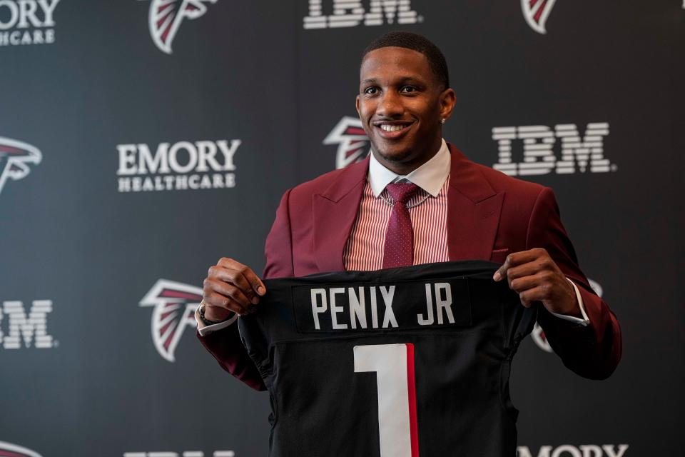 Atlanta Falcons first round draft pick quarterback Michael Penix Jr talks to the media at a press conference introducing him at the Falcons training complex.