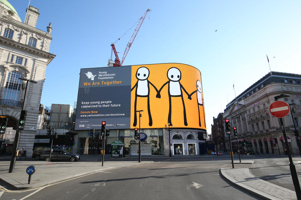 The Young Westminster Foundation (YWF), a charity that supports young people in the Westminster Borough, unveil their new and original digital artwork by the graffiti artist STIK on the Piccadilly Lights screen, at Piccadilly Circus, central London. (Photo by Jonathan Brady/PA Images via Getty Images)