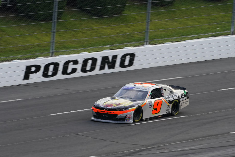 Noah Gragson (9) motors down a straight on his way to winning the NASCAR Xfinity Series auto race at Pocono Raceway, Saturday, July 23, 2022 in Long Pond, Pa. (AP Photo/Matt Slocum)