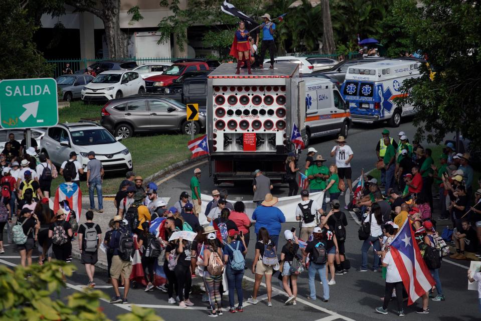 People take to the Las Americas Highway in San Juan, Puerto Rico, July 22, 2019 on day 9th of continuous protests demanding the resignation of Governor Ricardo Rosselló.