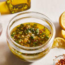 <p>This easy lemon-herb vinaigrette pairs nicely with grilled meat and veggies alike. Mix and match your favorite herbs to adjust the flavor to fit your meal. Grilling the lemon before juicing it brings out the fruit's sweetness and concentrates its flavors. But if you're not already planning to fire up the grill, this dressing is just as good with plain lemon juice.</p>