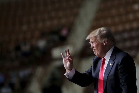 Republican U.S. presidential candidate Donald Trump reacts during a campaign event in Harrisburg, Pennsylvania, U.S., April 21, 2016. REUTERS/Carlos Barria