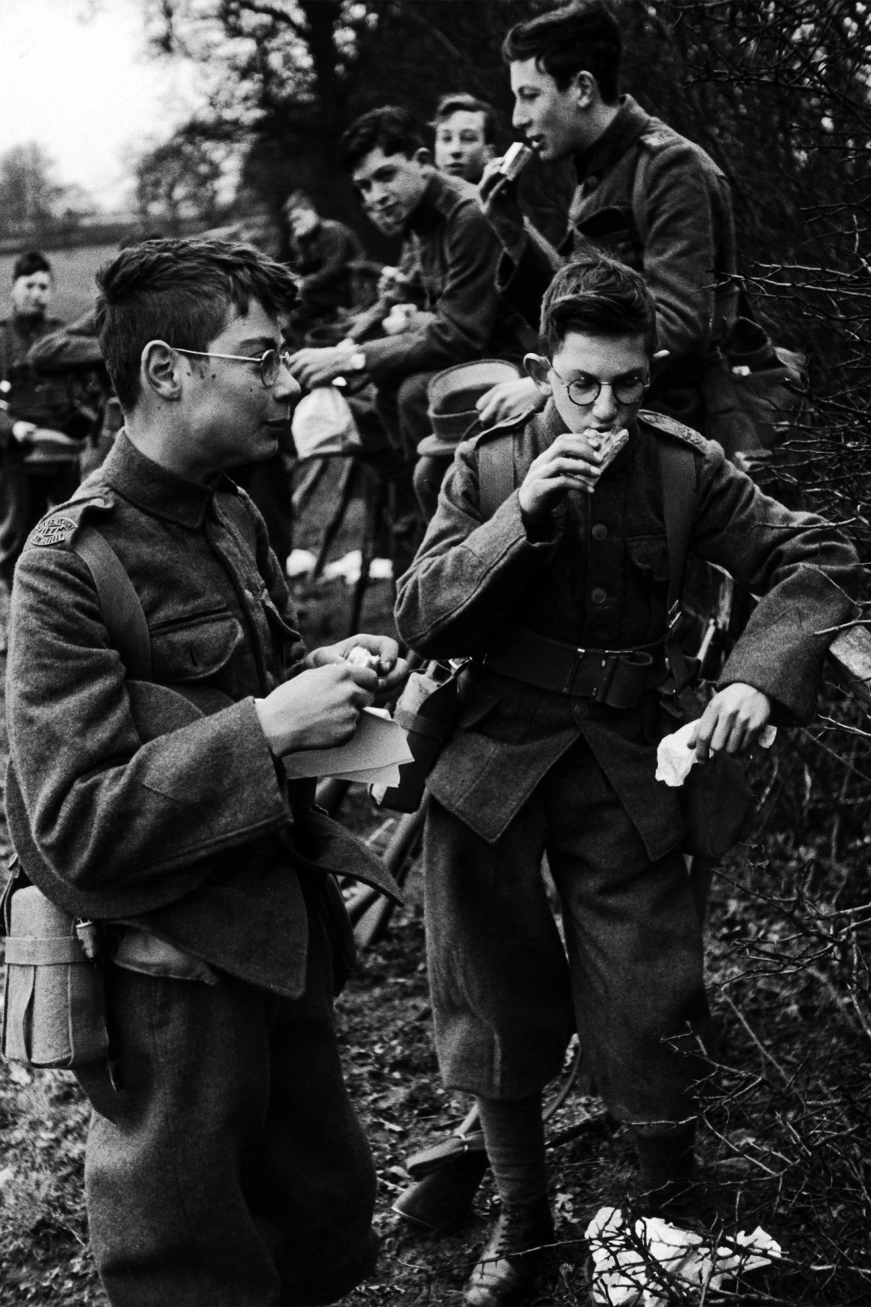 Members of the Shrewsbury public school O.T.C. (Officers Training Corps) stop for sandwiches during a day of field exercises