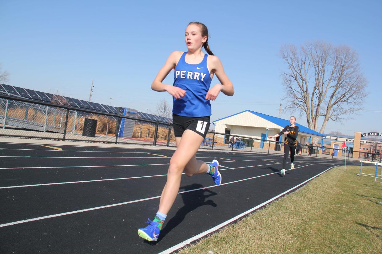 Perry's Lily Myers competes in the 3,000-meter run during the Jayette Relays on Thursday, March 28, 2024, in Perry.