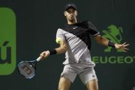 Mar 29, 2018; Key Biscayne, FL, USA; Borna Coric of Croatia hits a forehand against Alexander Zverev of Germany (not pictured) on day ten of the Miami Open at Tennis Center at Crandon Park. Mandatory Credit: Geoff Burke-USA TODAY Sports