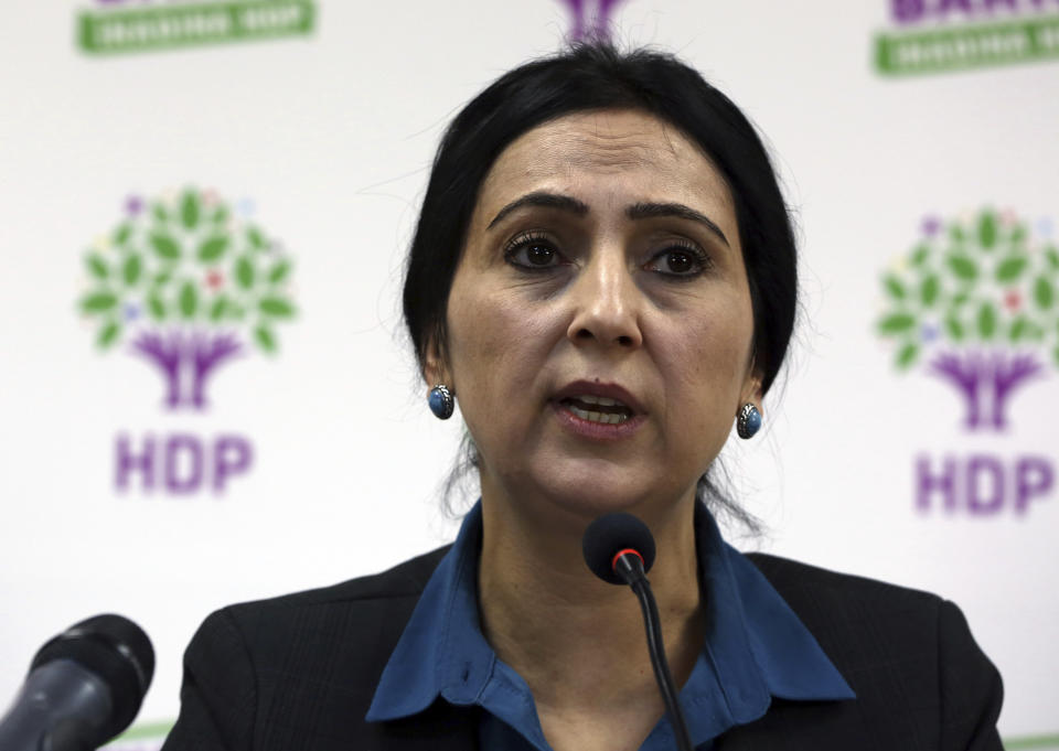 FILE - Co-chairwoman of pro-Kurdish People's Democratic Party, or HDP, Figen Yuksekdag speaks to the media in Ankara, Turkey on Nov. 1, 2015. A Turkish court on Thursday, May 16, 2024 sentenced dozens pro-Kurdish politicians to between nine and 30 years in prison over riots in 2014 by Kurds angered at what they perceived to be the government’s inaction against Islamic State group militants who had besieged the Syrian border town of Kobane, state media reported. (AP Photo/Burhan Ozbilici, File)