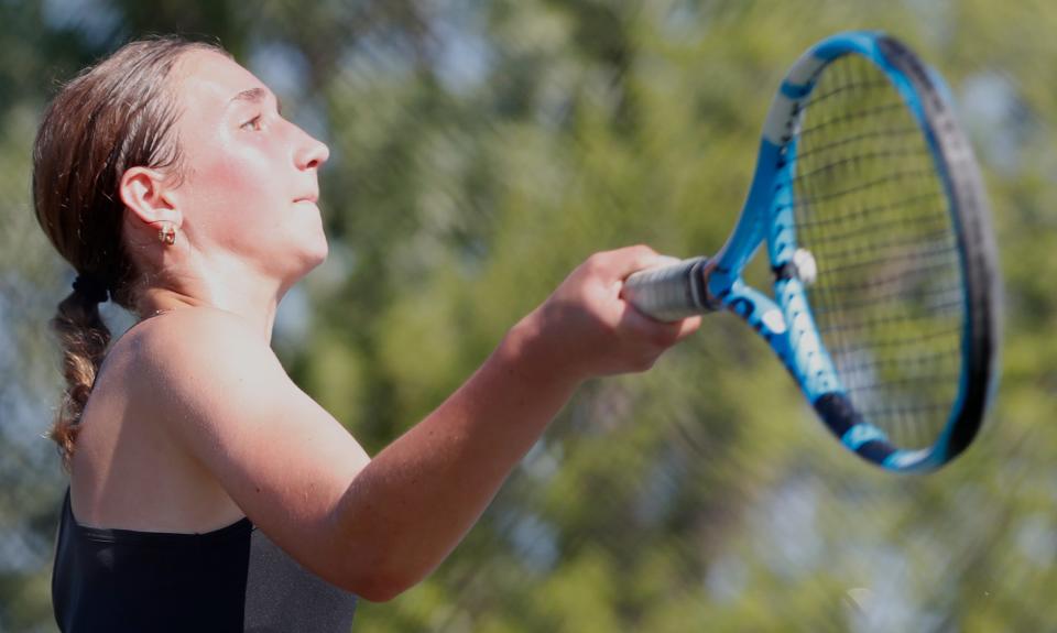 Benton Central Violet Hardeback hits the ball during the IHSAA girl’s tennis sectional meet, Saturday, May 18, 2024, at Harrison High School in West Lafayette, Ind.