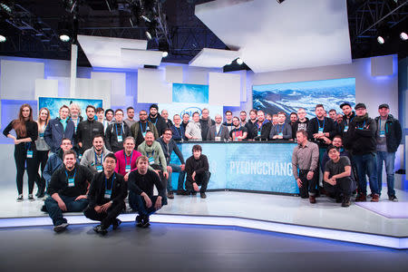 Athletes pose for a photo during the Intel Extreme Masters PyeongChang esports tournament in Gangneung, South Korea, February 7, 2018. Intel/Handout via REUTERS 