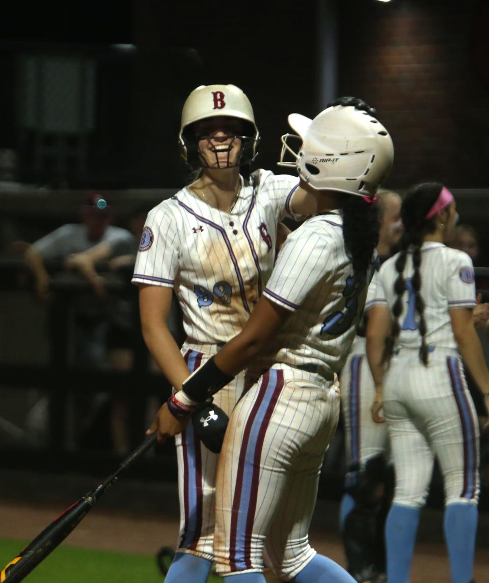 Ballard’s Emory Donaldson celebrates with teammate Mikayla Milby after scoring against Eastern in the 7th Region Championship.May 23, 2023