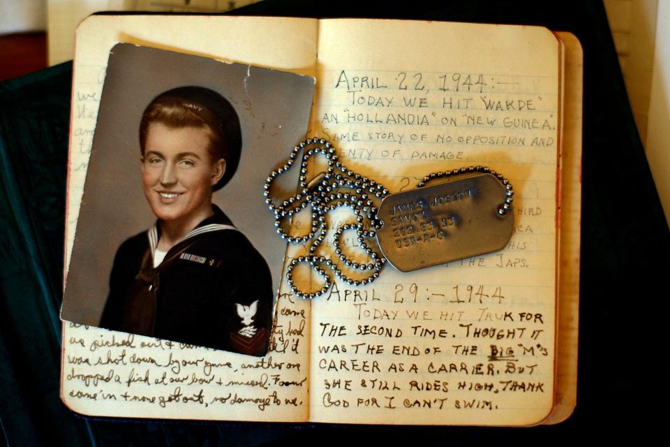 The late James Michael Savoy, of Weymouth, a disabled veteran, kept a diary when he served in the Navy during World War II. His wife, Muriel, and son, Michael, rediscovered the diary after Savoy died in 1983. The photo shows James Savoy circa 1944 with a page from his diary and his dog tags. Photo: The Patriot Ledger