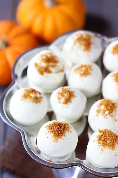 <p>Make an easy treat for a <a href="https://www.thepioneerwoman.com/news-entertainment/g32177134/best-halloween-movies/" rel="nofollow noopener" target="_blank" data-ylk="slk:Halloween movie;elm:context_link;itc:0;sec:content-canvas" class="link ">Halloween movie</a> night with these truffles. They're packed with pumpkin flavor and seasonal spices.</p><p><strong>Get the recipe at <a href="https://www.gimmesomeoven.com/pumpkin-cream-cheese-truffles/" rel="nofollow noopener" target="_blank" data-ylk="slk:Gimme Some Oven;elm:context_link;itc:0;sec:content-canvas" class="link ">Gimme Some Oven</a>.</strong></p><p><strong><a class="link " href="https://go.redirectingat.com?id=74968X1596630&url=https%3A%2F%2Fwww.walmart.com%2Fsearch%2F%3Fquery%3Dfood%2Bprocessor&sref=https%3A%2F%2Fwww.thepioneerwoman.com%2Ffood-cooking%2Fmeals-menus%2Fg33565118%2Fpumpkin-dessert-recipes%2F" rel="nofollow noopener" target="_blank" data-ylk="slk:SHOP FOOD PROCESSORS;elm:context_link;itc:0;sec:content-canvas">SHOP FOOD PROCESSORS</a><br></strong></p>