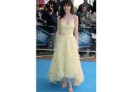 <b>2005</b> <br>A mellow yellow, frilly dress suits Zooey's happy-go-lucky attitude.