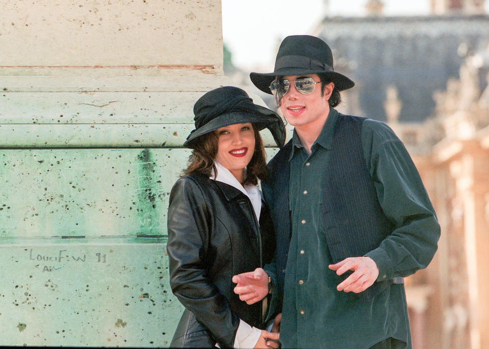 Lisa Marie Presley and Michael Jackson pose at the 