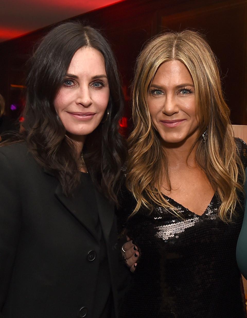 Courteney Cox (L) and Jennifer Aniston pose at the after party for the premiere of Netflix's "Dumplin'" in December.