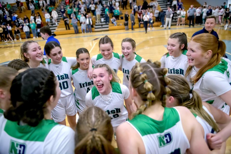 Peoria Notre Dame's Mya Wardle screams "we're going to state" as the team celebrates their 55-39 win over Rock Island-Alleman in the Class 2A super-sectional Monday, Feb. 26, 2024 at Bureau Valley High School in Manlius.