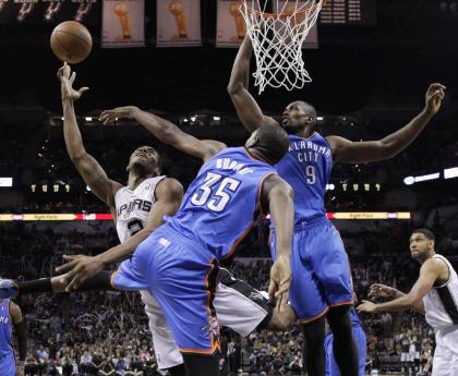 Serge Ibaka's presence in the paint has stifled San Antonio before. (AP/Eric Gay)