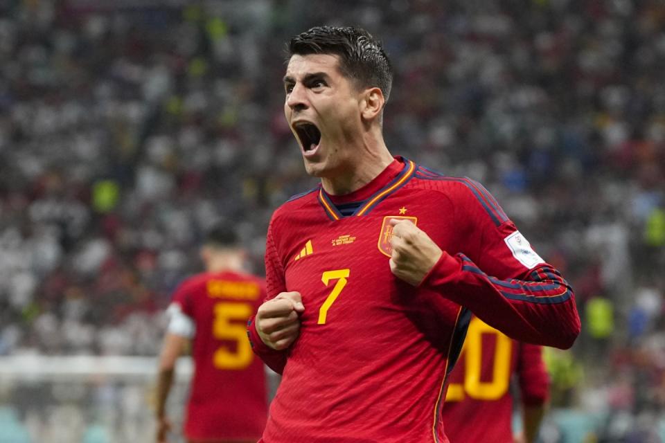 Spain's Alvaro Morata celebrates after scoring the opening goal during the World Cup group E football match between Spain and Germany, at the Al Bayt Stadium in Al Khor , Qatar, Sunday, Nov. 27, 2022. (AP Photo/Matthias Schrader)