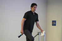 Golden State Warriors president and general manager Bob Myers makes his way to the podium before an NBA basketball news conference in San Francisco, Tuesday, May 30, 2023. Myers is departing the Warriors after building a championship team that captured four titles in an eight-year span. One of the most successful GMs over the past decade in any sport, Myers' contract was set to expire in late June. (AP Photo/Eric Risberg)