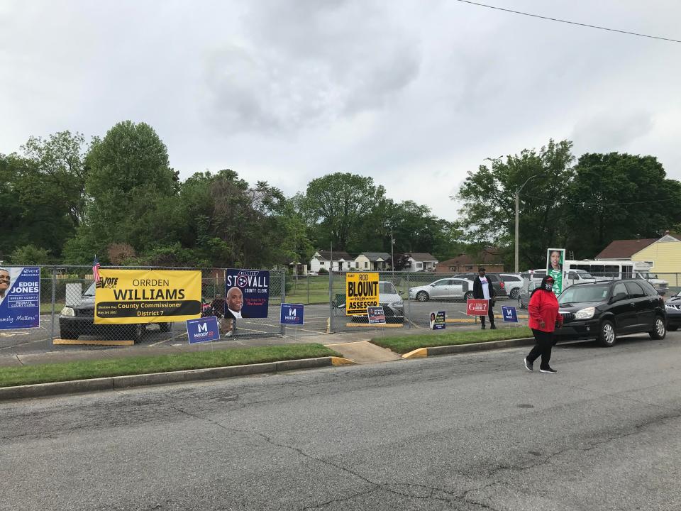 Poll workers and signs at Springdale Baptist Church on Tuesday, May 3.