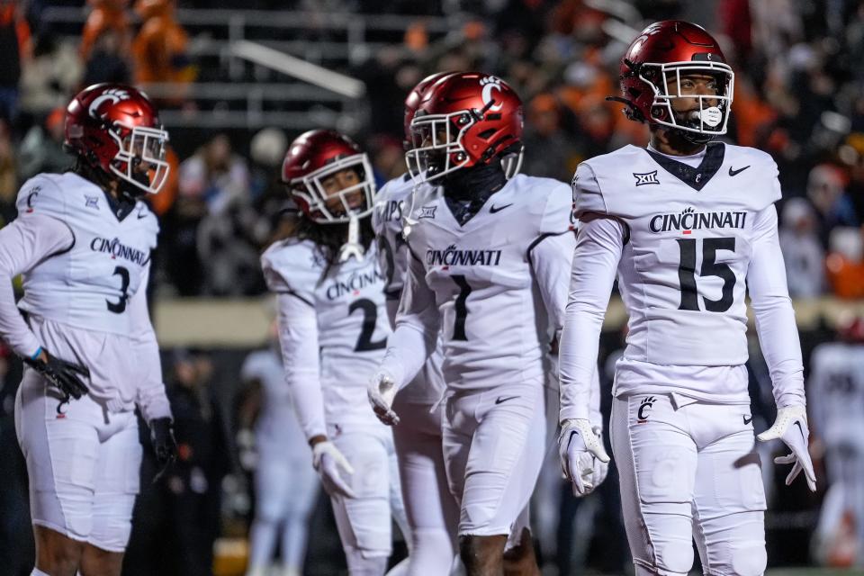 The Cincinnati Bearcats defense paces after a Oklahoma State Cowboys wide receiver Brennan Presley (80) touchdown in the third quarter of the NCAA Big12 football game between the Oklahoma State Cowboys and the Cincinnati Bearcats at Boone Pickens Stadium in Stillwater, Okla., on Saturday, Oct. 28, 2023.