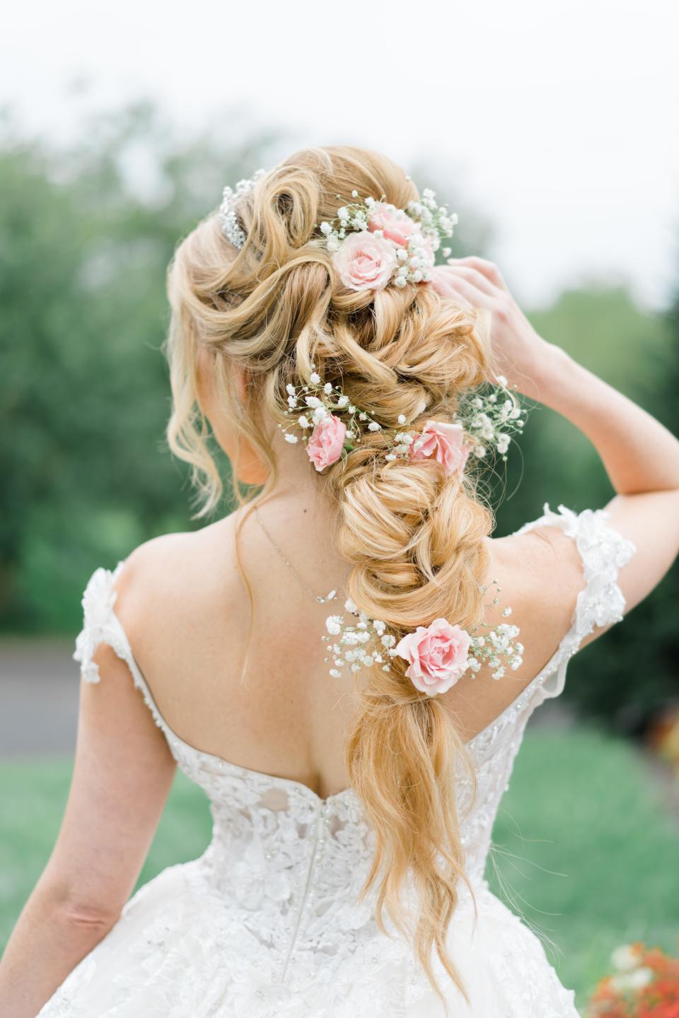 Krystyna Amalfe used flowers in her hair for her Sept. 2021 wedding to help create the feeling of a romantic fairytale.
