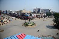 A general view of deserted Subhash Chowk is seen during a one-day Janata (civil) curfew imposed as a preventive measure against the COVID-19 coronavirus, in Allahabad on March 22, 2020. - Nearly one billion people around the world were confined to their homes, as the coronavirus death toll crossed 13,000 and factories were shut in worst-hit Italy after another single-day fatalities record. (Photo by SANJAY KANOJIA / AFP) (Photo by SANJAY KANOJIA/AFP via Getty Images)